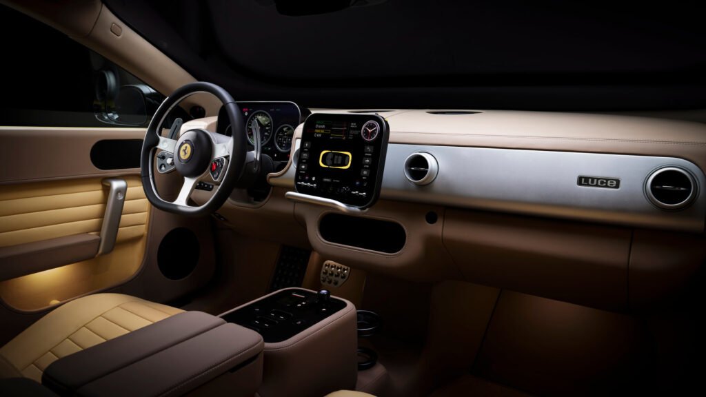 The Ferrari Luce dashboard features Apple Watch-like crowns, an infotainment panel with an iPad-like screen sensibility, and Gorilla Glass throughout.