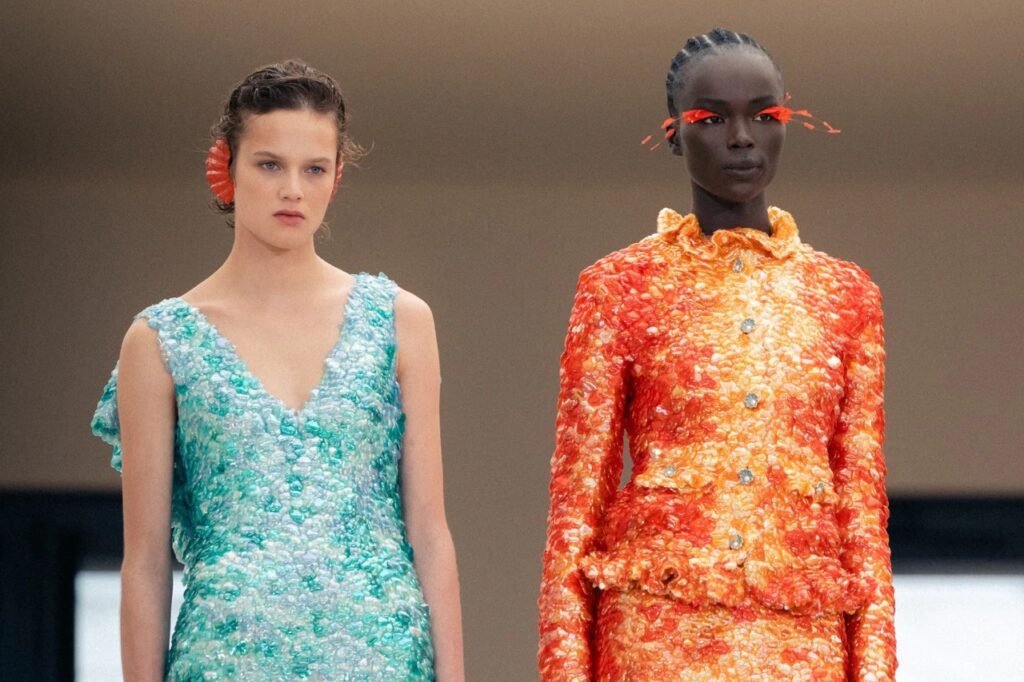 Breathtaking gowns adorned with iridescent paillettes resembling mermaid scales at the Chanel Cruise 2027 show.