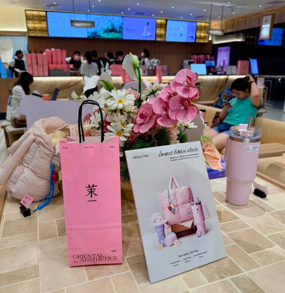 Oriental Aesthetics,” printed like a manifesto. The giftable jasmine bag and limited-edition merch signage borrow the grammar of a maison