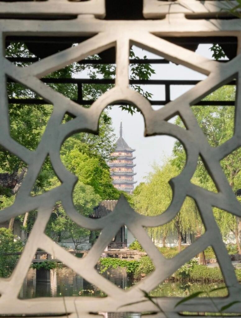 A four-lobed window in a Suzhou classical garden — the same city, and arguably the same visual tradition, in which the case against Molly Tea was decided.
